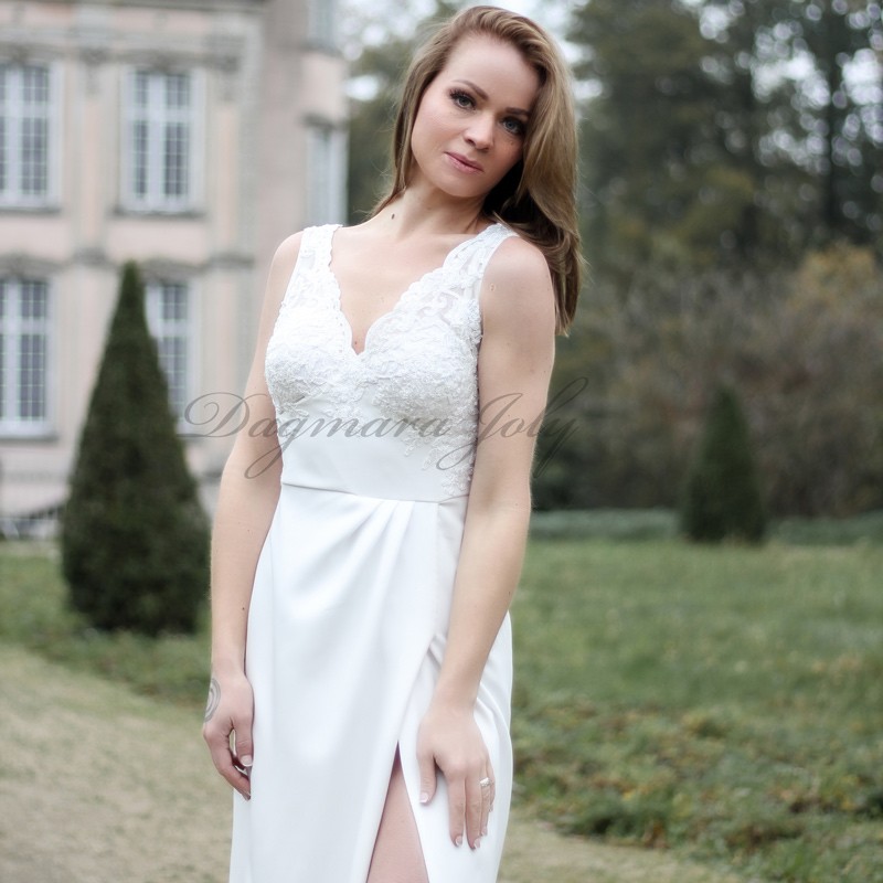 High slit sleeveless wedding dress with train, it has V neckline and V back