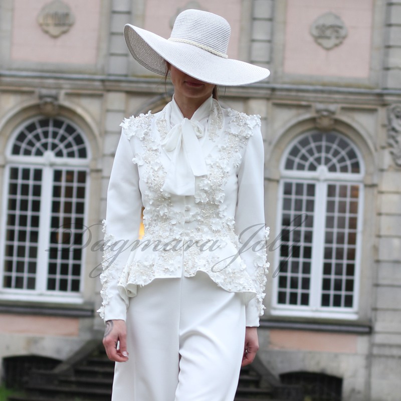 White bridal pants suit with asymmetrical jacket and wide legged pants