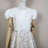 Alternative midi length wedding dress with short sleeves and V at the back