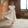 Alternative midi length wedding dress with short sleeves and V at the back