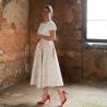 Alternative midi length wedding dress with short sleeves and V at the back